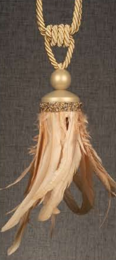 Gold tassel pendant with feather-like strands hanging from a braided cord
