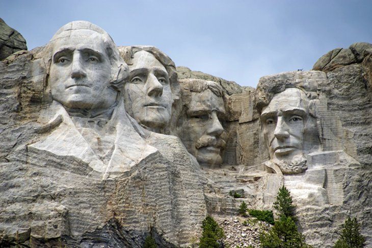 The four presidents of the united states are carved into the side of a mountain.