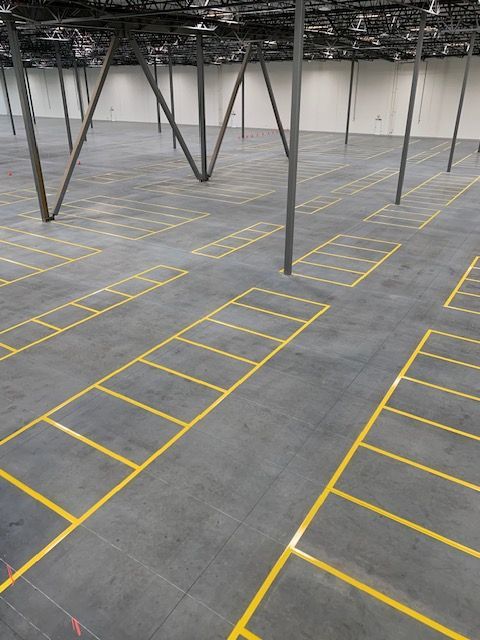 A parking lot with the number 202 painted on it