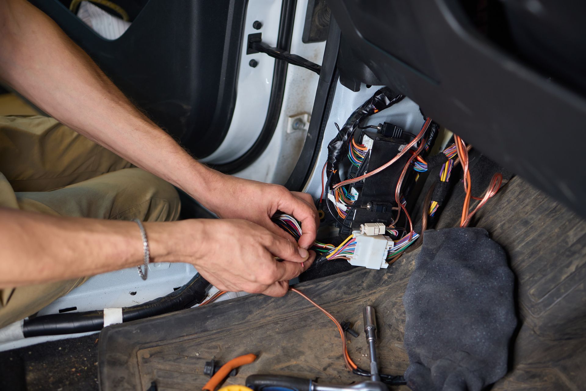 Mechanic working on electrical | Agape Auto Repair
