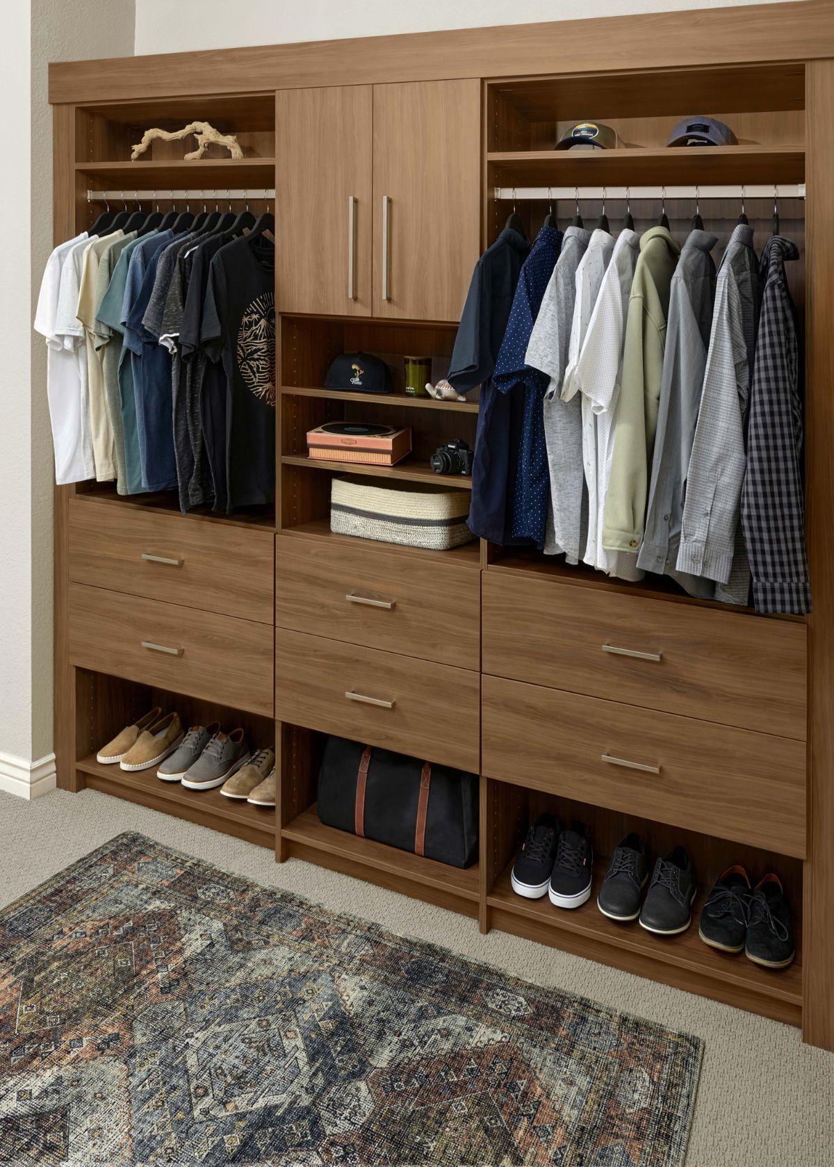 a bedroom with a reach in closet and a bed