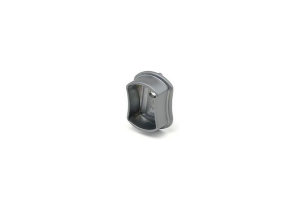 A close up of a gray object on a white background.