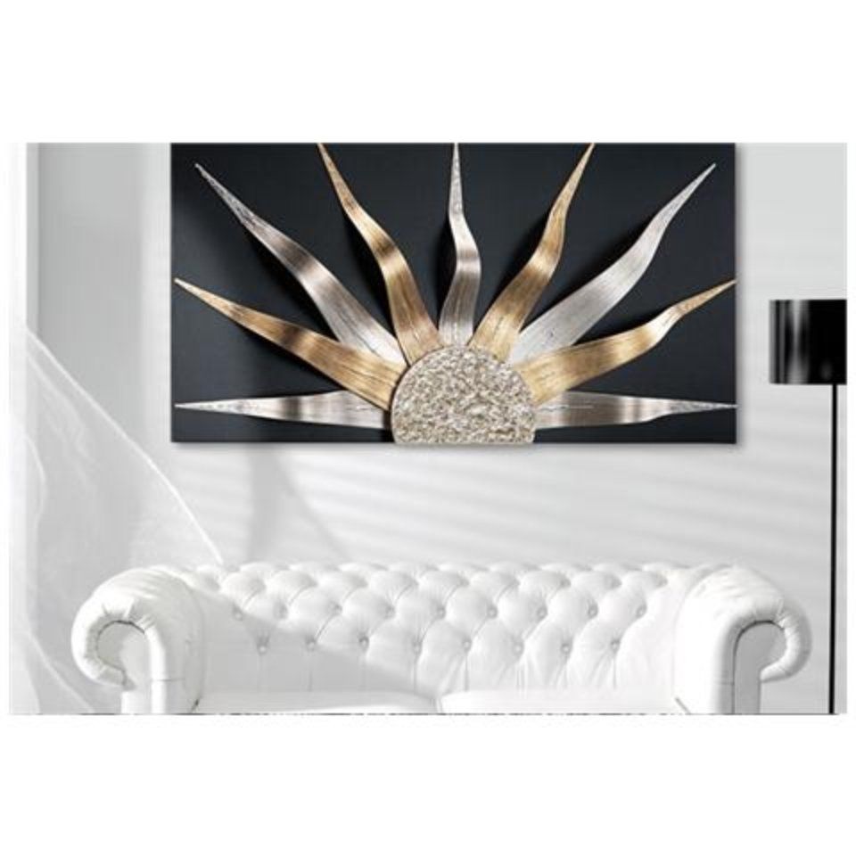 decorazione murale con sole in lamiera stilizzato