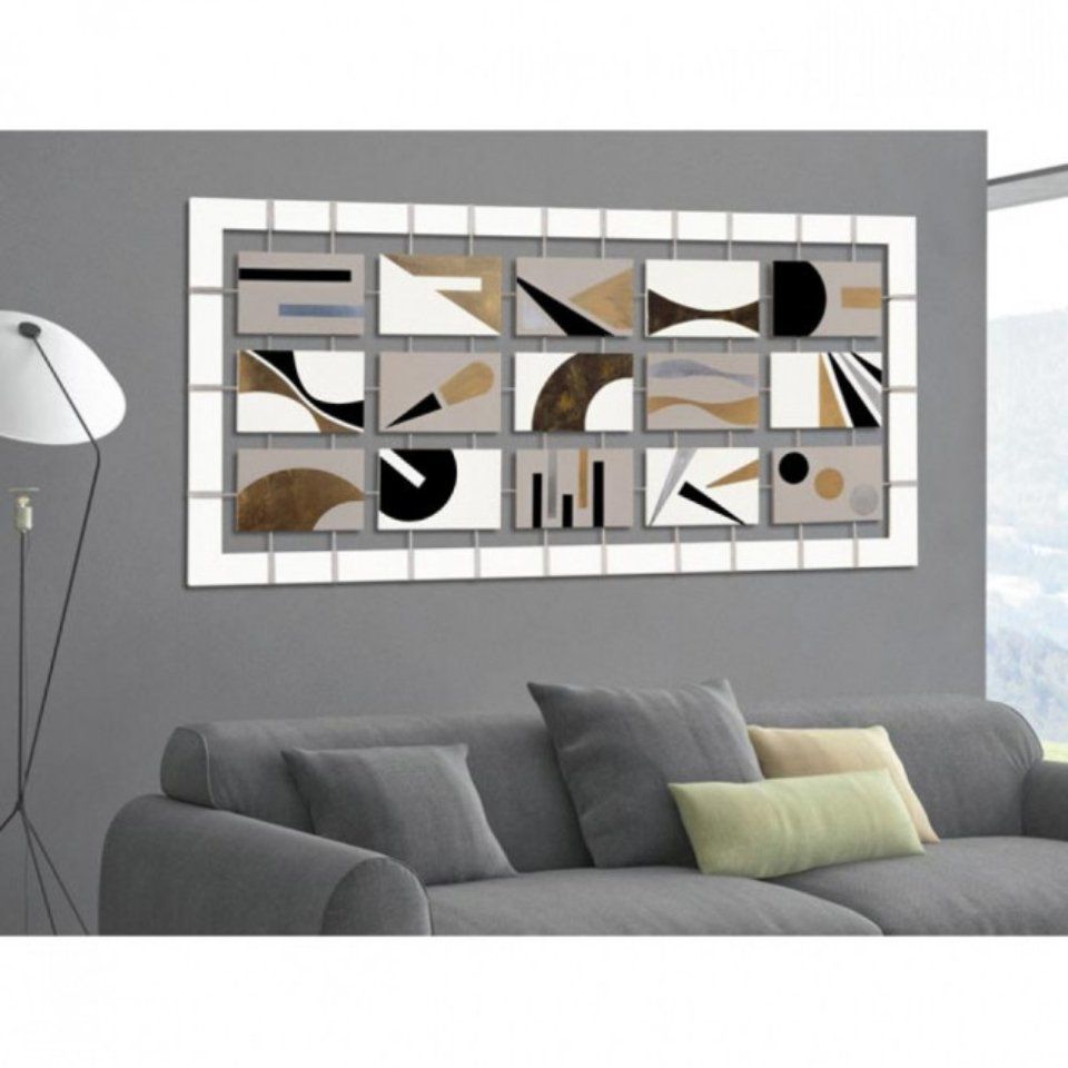 decorazione murale di design con rettangoli bianchi, grigi e oro
