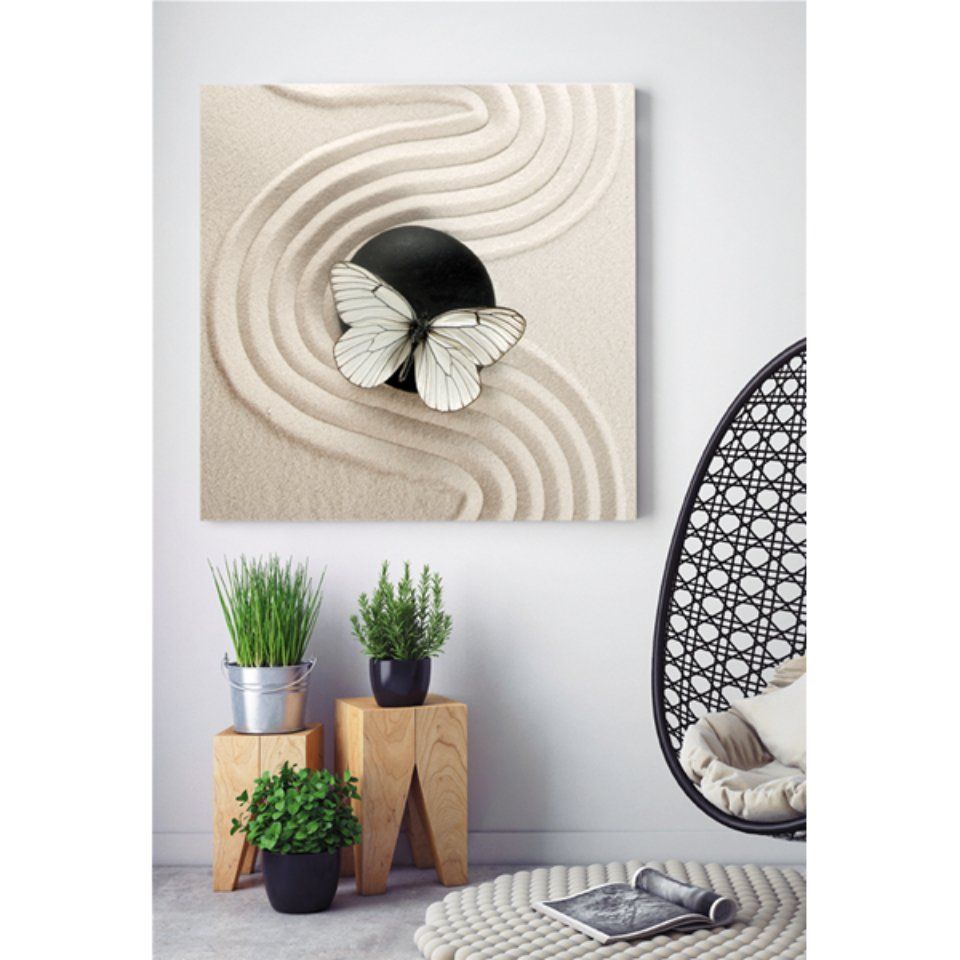 decorazione murale con sabbia e farfalla