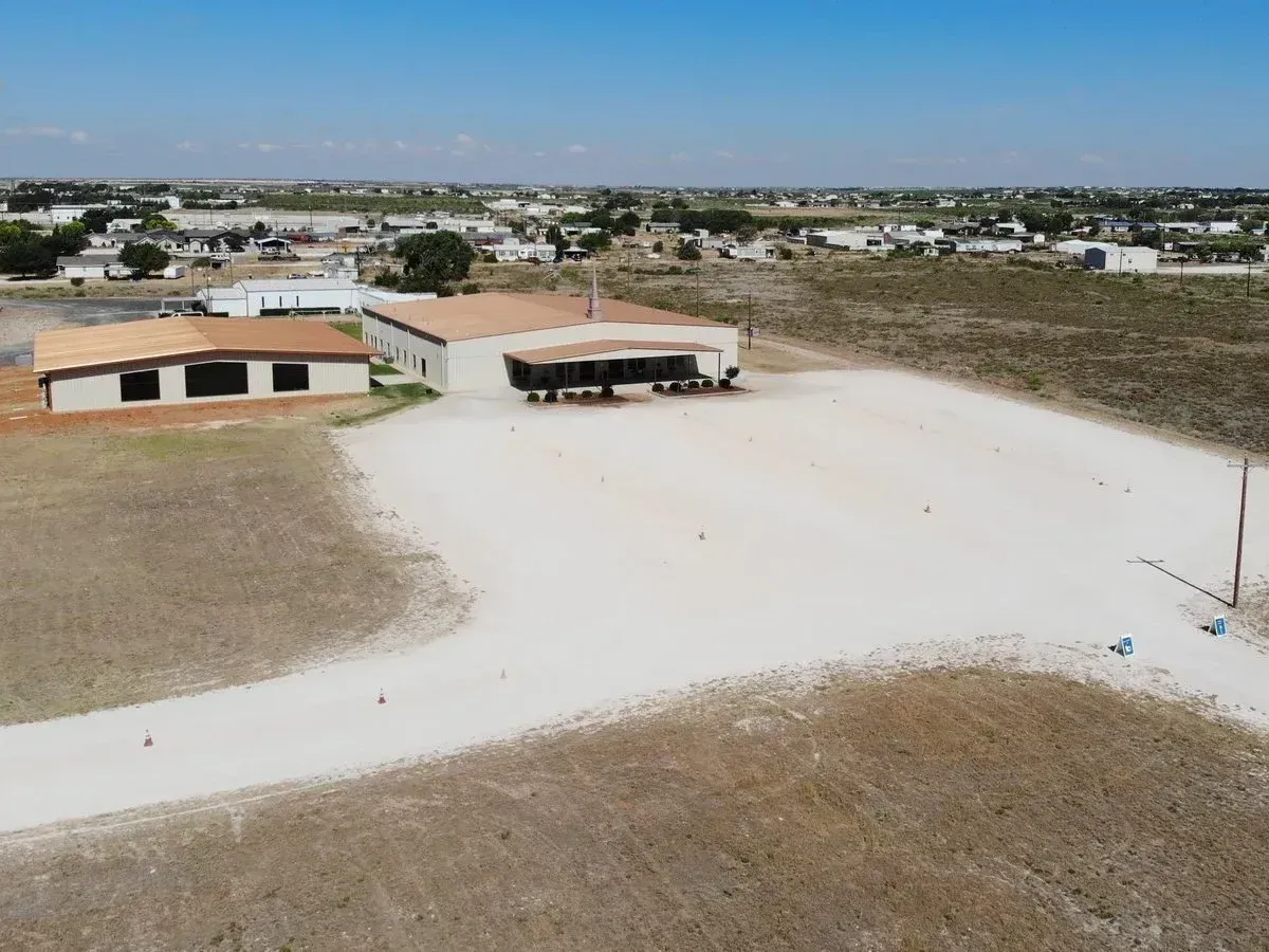 Gravel parking lot installation next to a church in Hidalgo County, Texas.