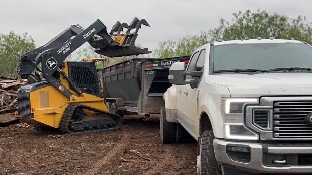 Landscape debris in a temporary trash container in Hidalgo County, TX.