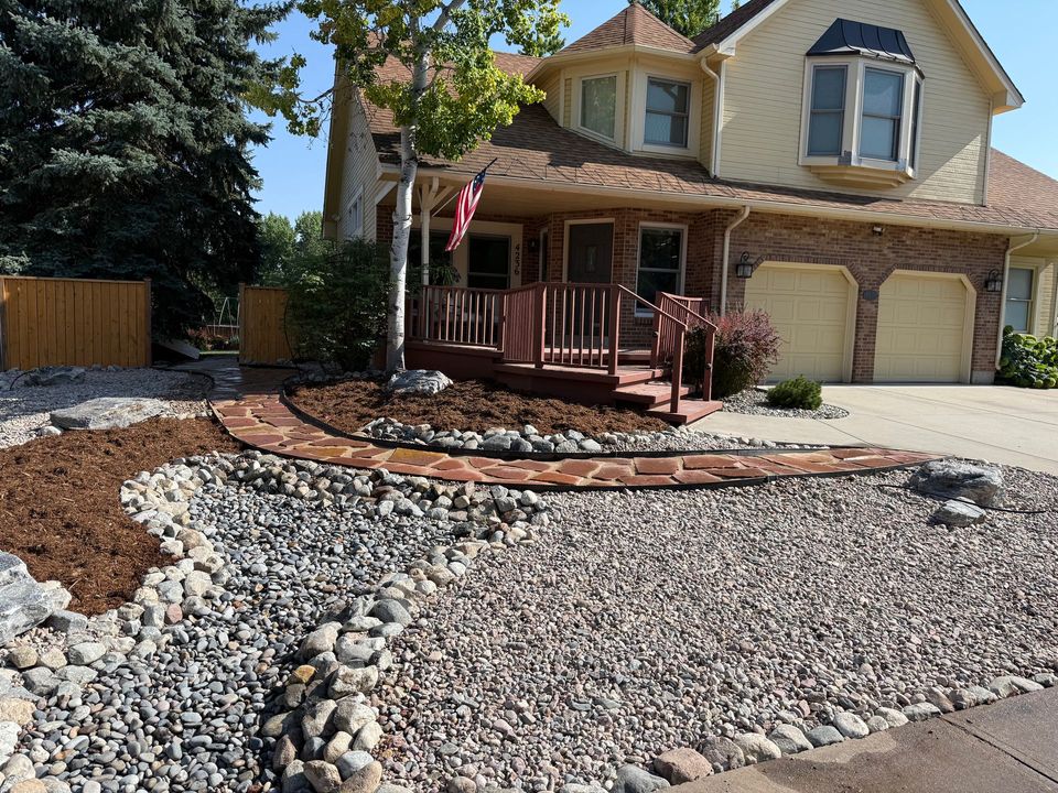 Xeriscape with boulders, ornamental grasses, and lighting