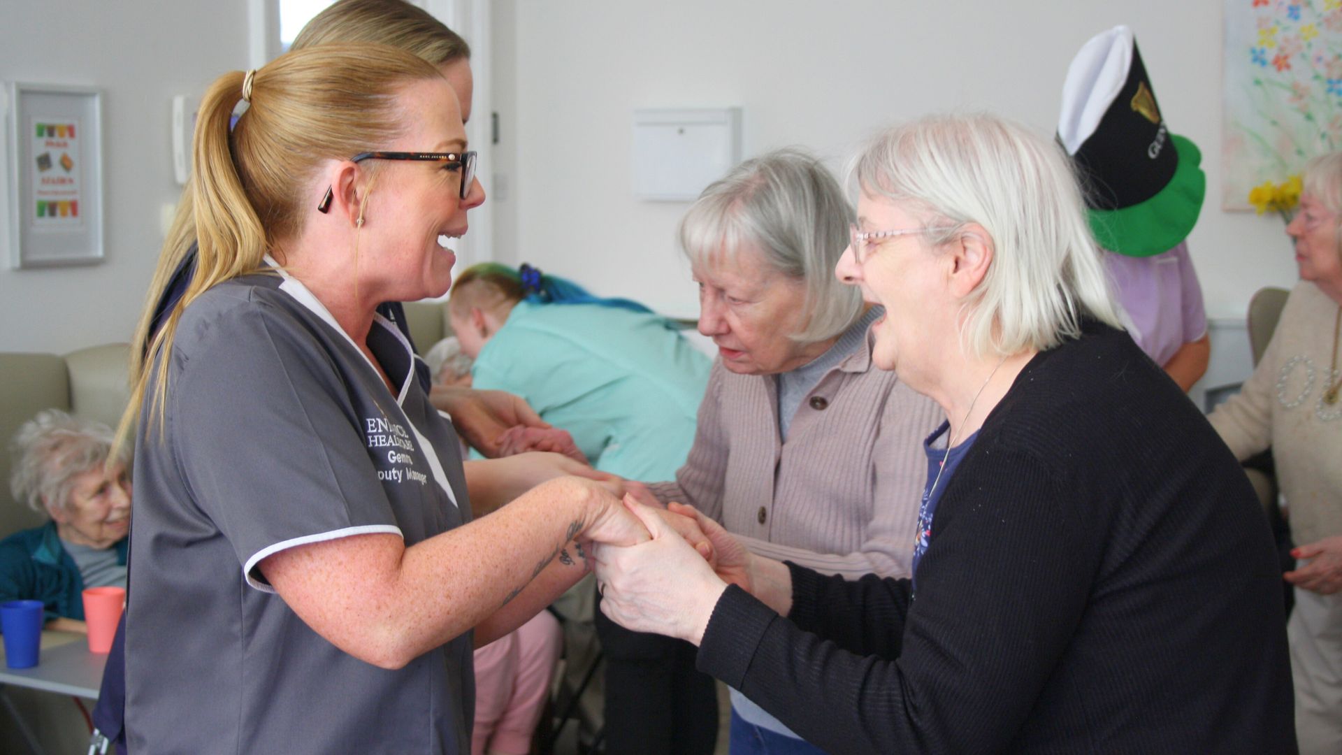 A nurse dancing with a woman
