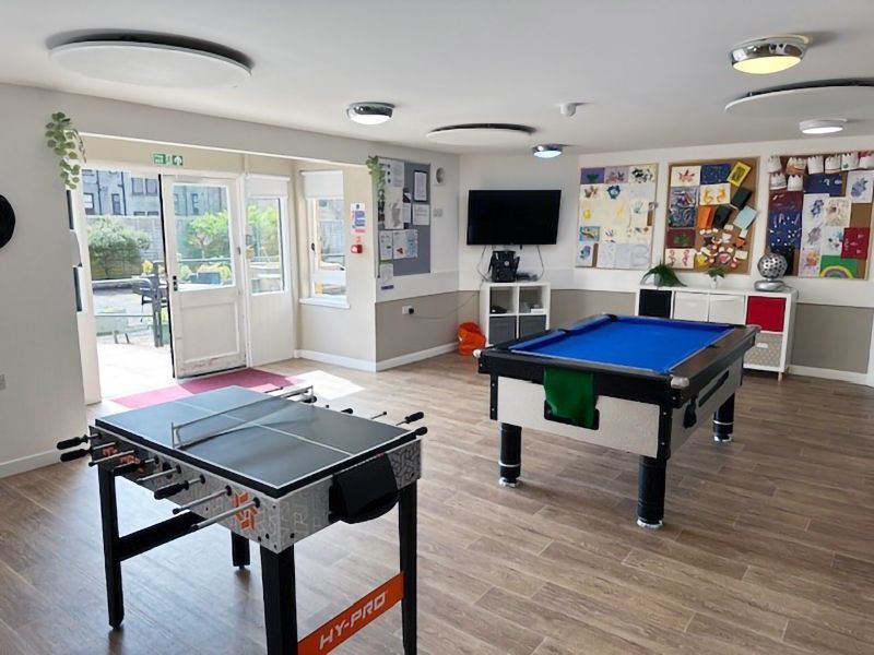 McGonagall House games room with table football and pool table