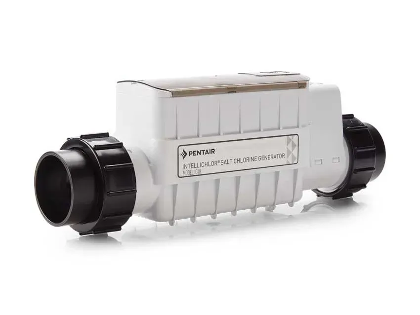 A white and black pipe with a label on it is sitting on a white surface.