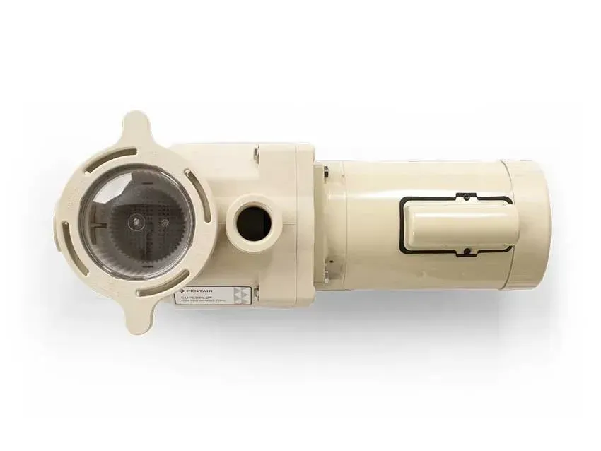 A close up of a swimming pool pump on a white background.