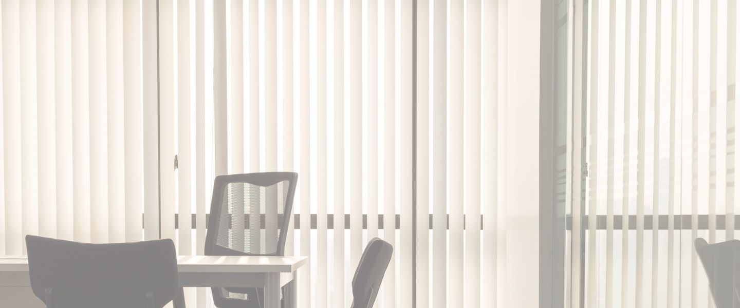 An Office And Blinds On The Windows — Ron Ayton Curtains, Blinds & Shutters In Shelly Beach, NSW