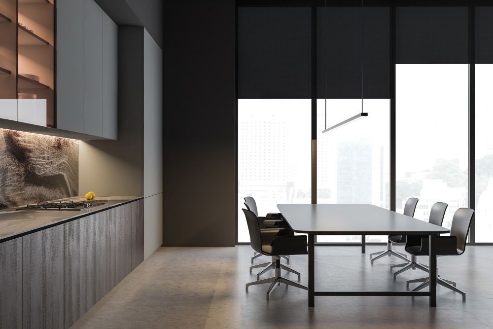A Long Table And Chairs In Front Of A Window — Ron Ayton Curtains, Blinds & Shutters In Shelly Beach, NSW