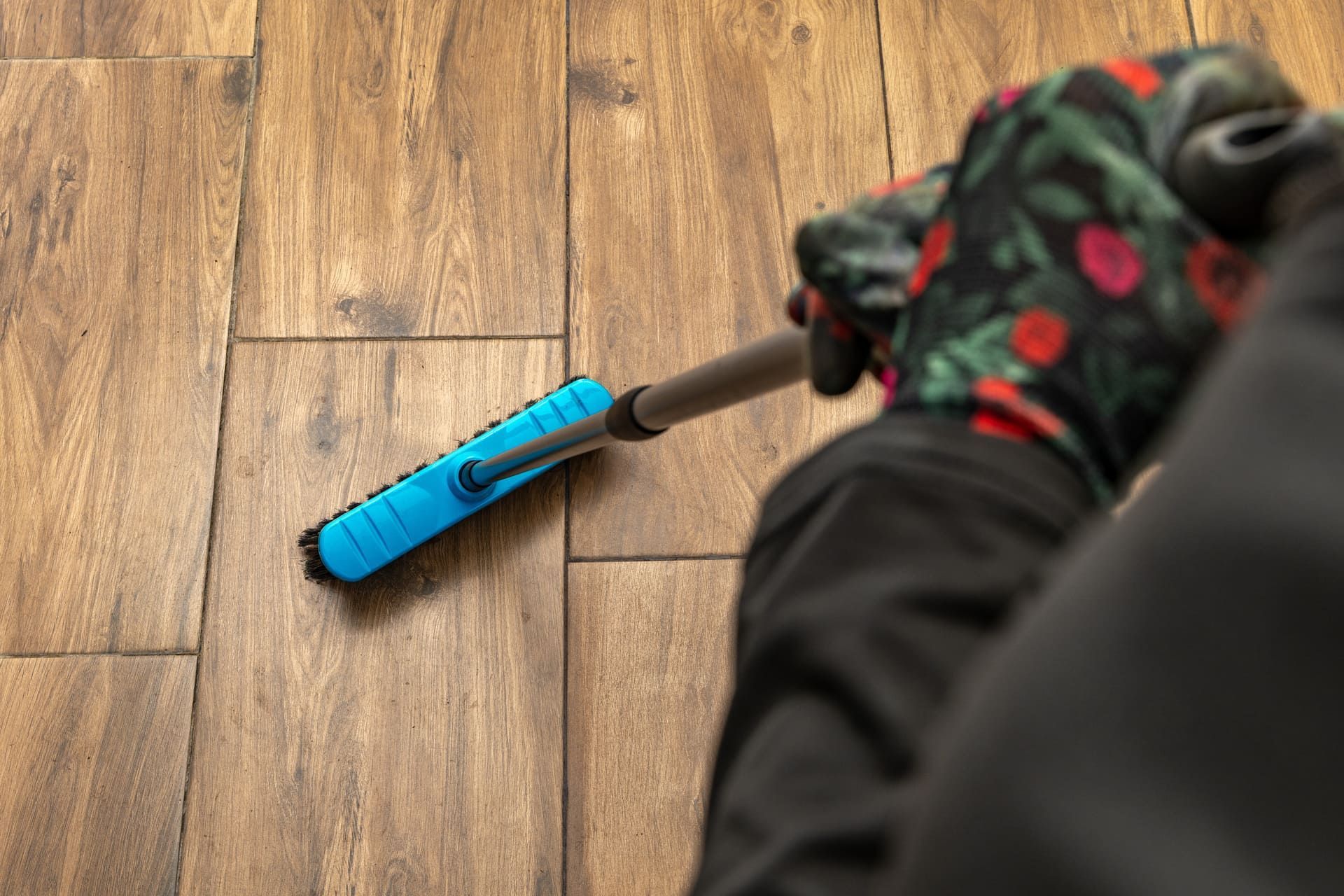 Broom and Mop on Terrace Tiles During Spring Patio Cleaning After Winter