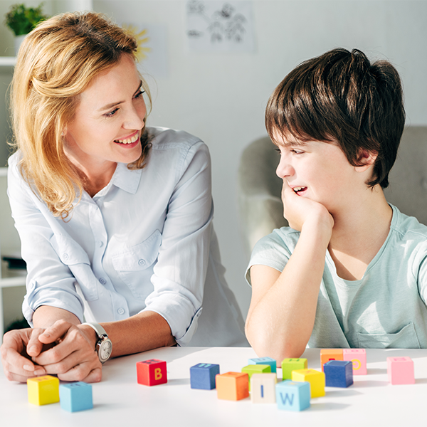 a woman and a child talking to each other