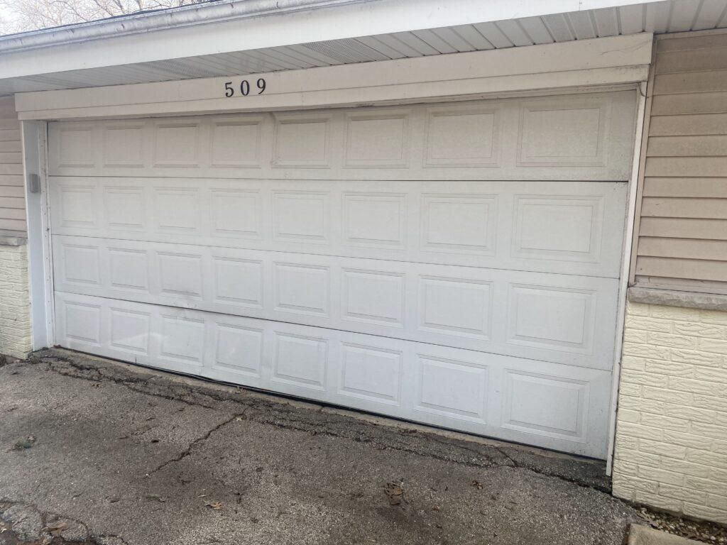 garage door with damaged panels