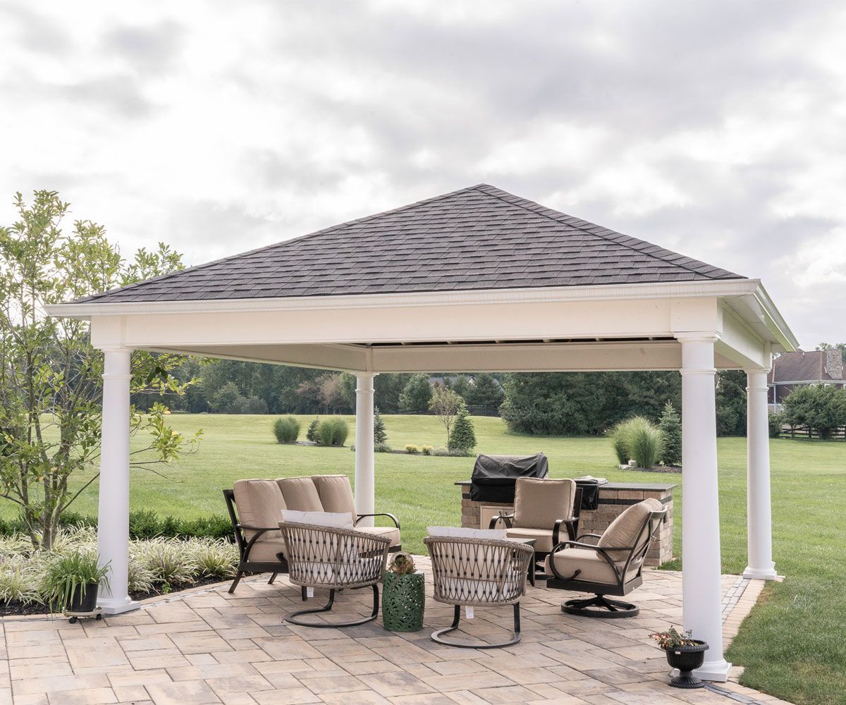 Amish-Crafted outdoor structure backyard pavilion on Fairlawn, Ohio paver patio with outdoor furniture.