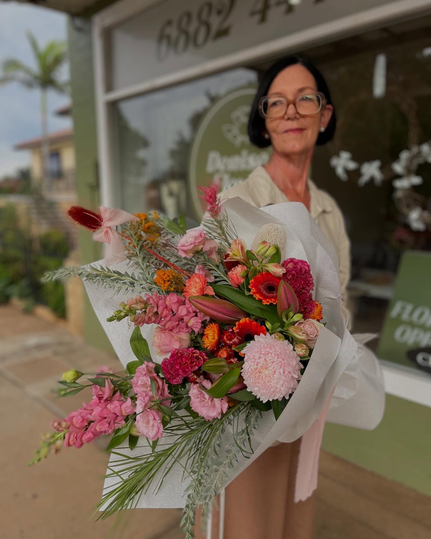 Woman Holding Colourful Flower Bouquet — Denise's Flower Studio In Wellington, NSW