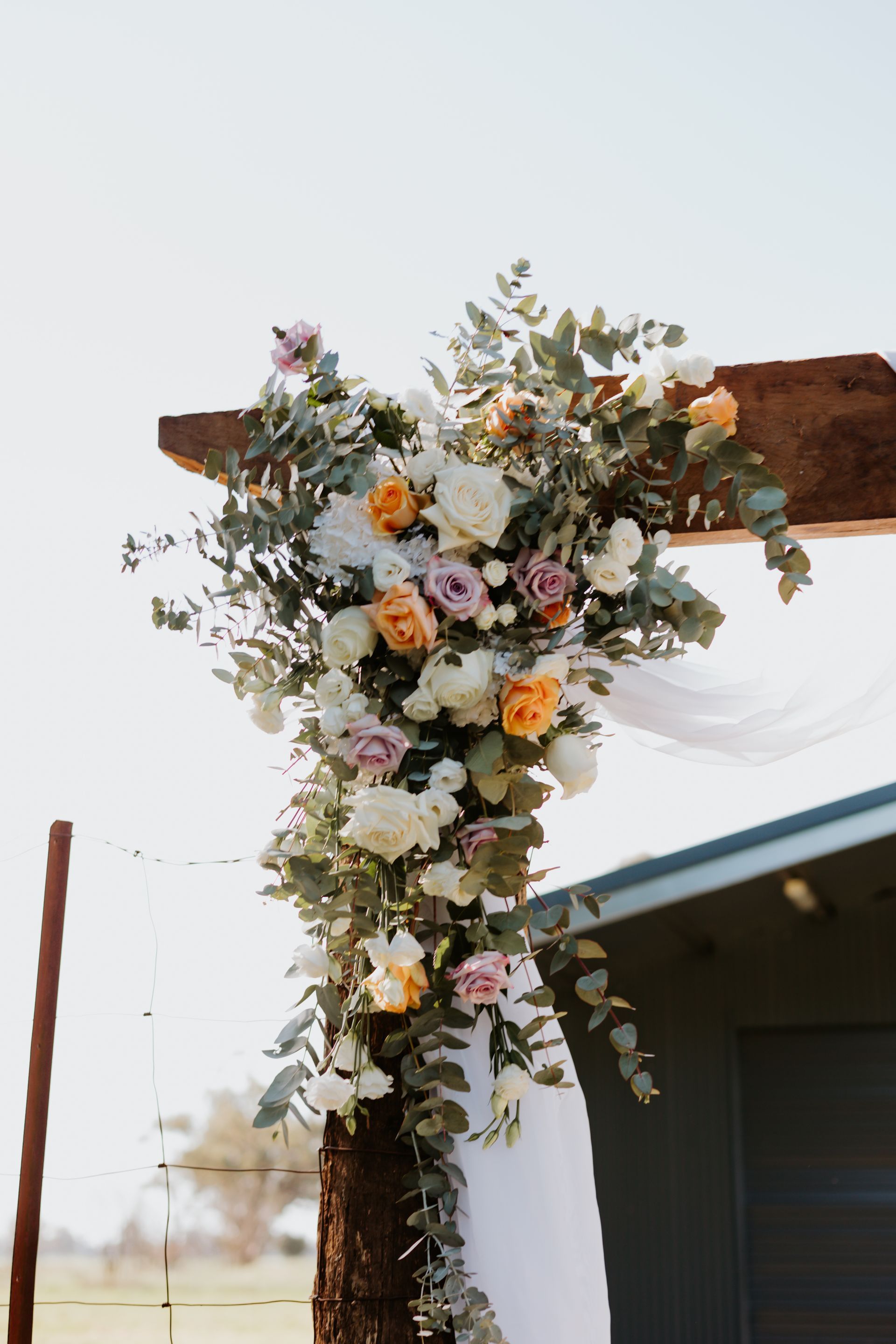 Floral Arrangement on Wooden Arch — Denise's Flower Studio In Dubbo, NSW