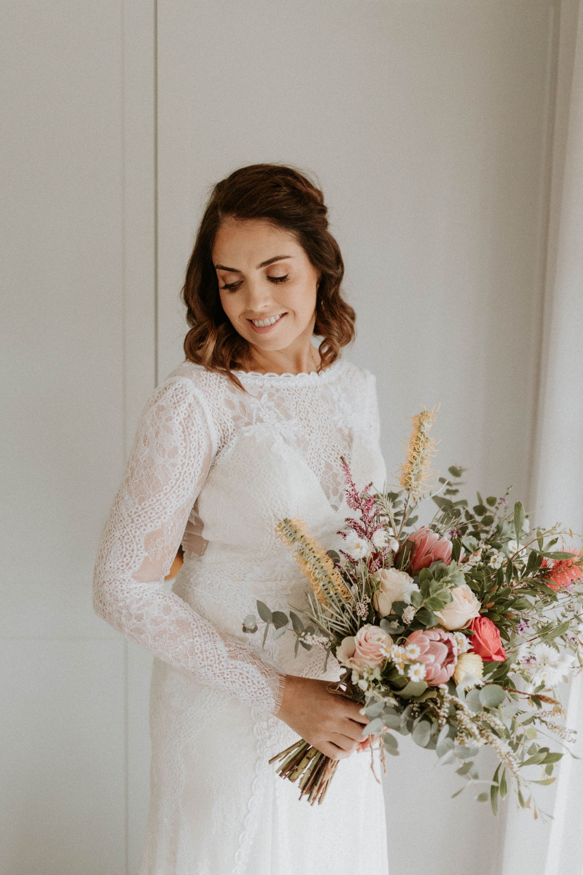 Bride in White Lace Dress, Holding Floral Bouquet — Denise's Flower Studio In Dubbo, NSW