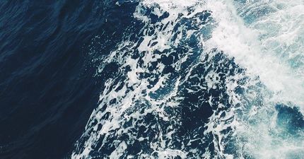 A close up of a wave in the ocean.