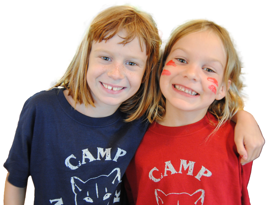 A girl with paint on her face is wearing a blue shirt that says camp mini girl