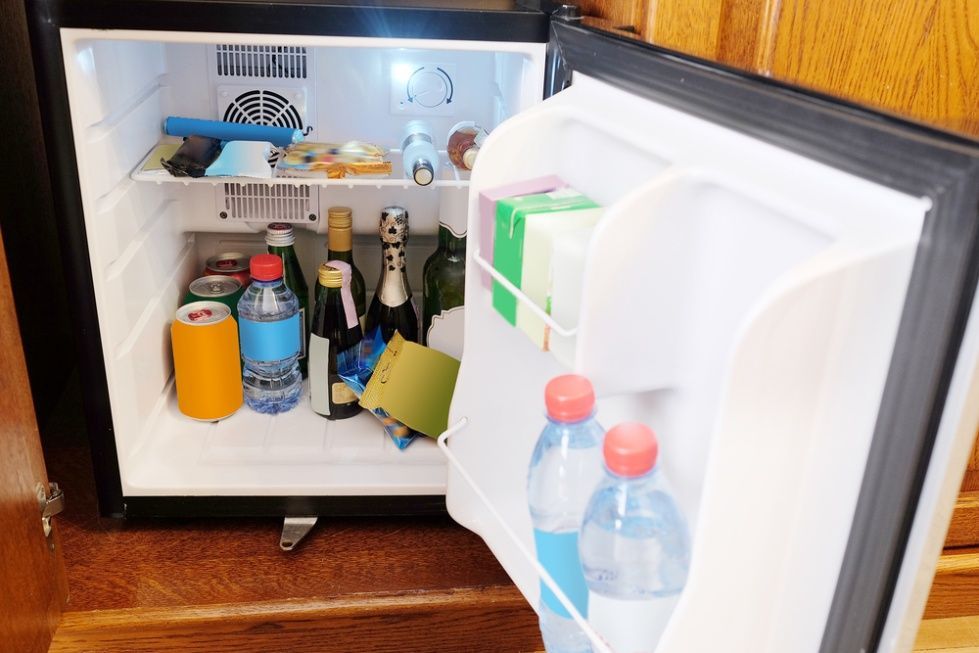 A Small Refrigerator Filled With Beverages — Chilltech Air Conditioning & Refrigeration In Rockyview, QLD