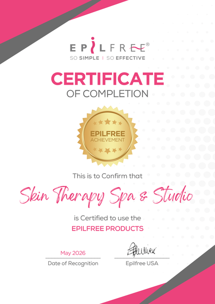 Pink and white certificate of completion with gold seal for Skin Therapy Spa & Studios