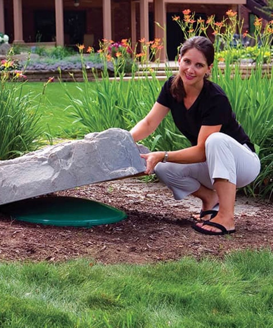 Woman Lifting Fake Stone