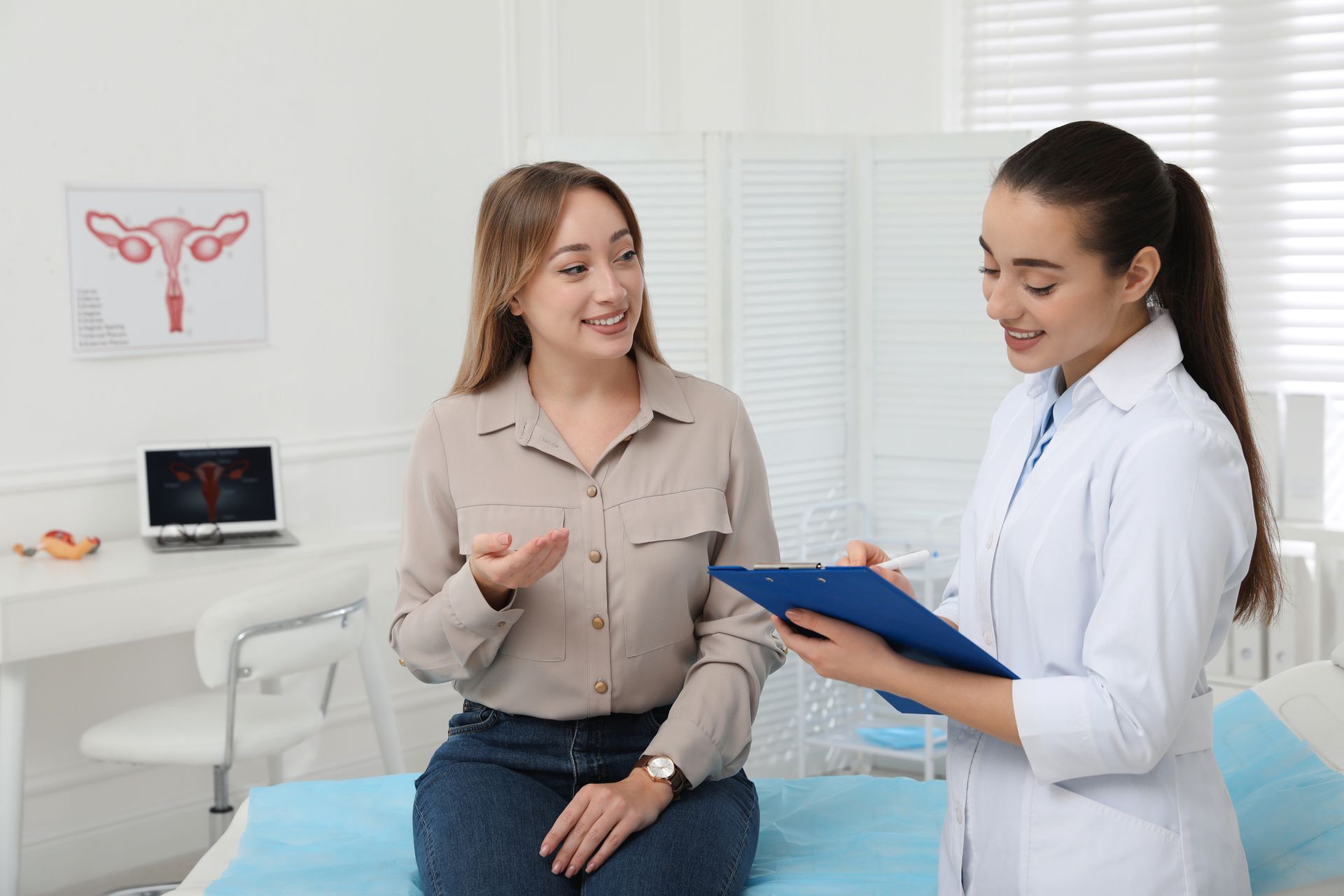 A woman is having an appointment with her gynecologist. 