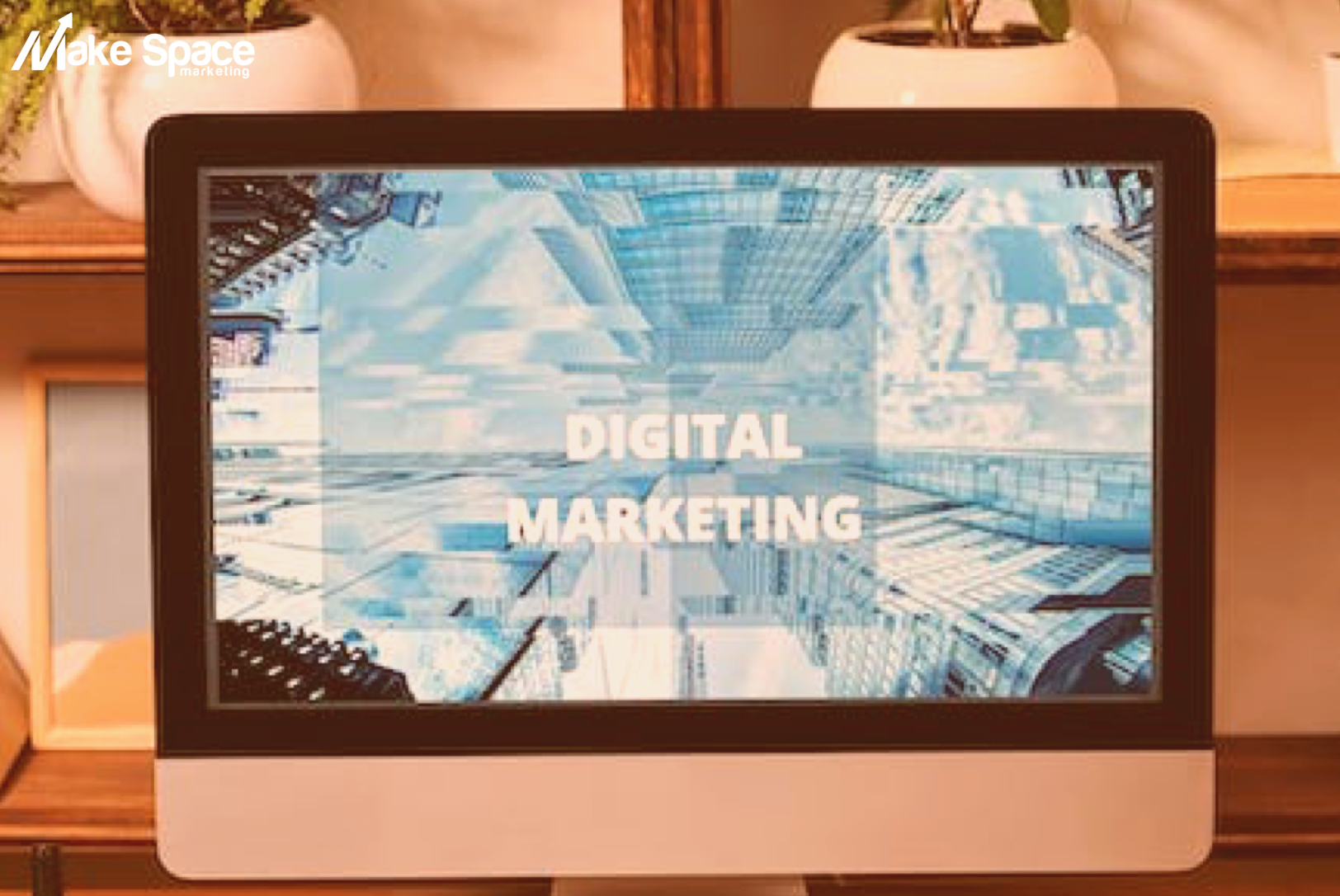 A computer monitor with the words `` digital marketing '' on the screen.