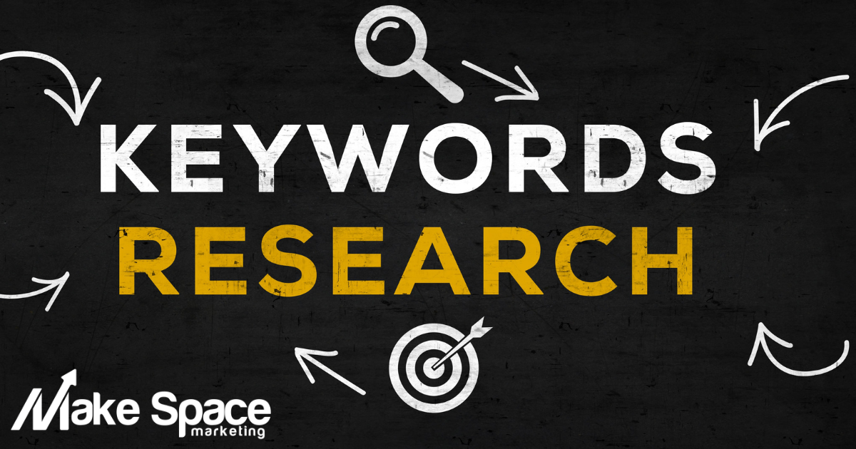 A blackboard with the words keywords research written on it