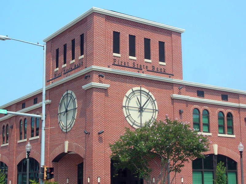 Brick building with large clock, 