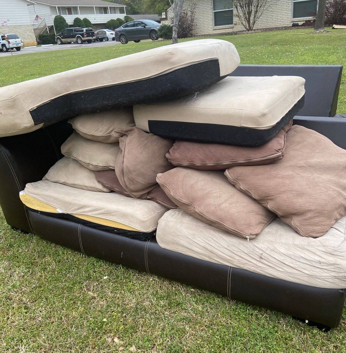 sofa and cushions at curb, furniture pickup and removal in longview tx