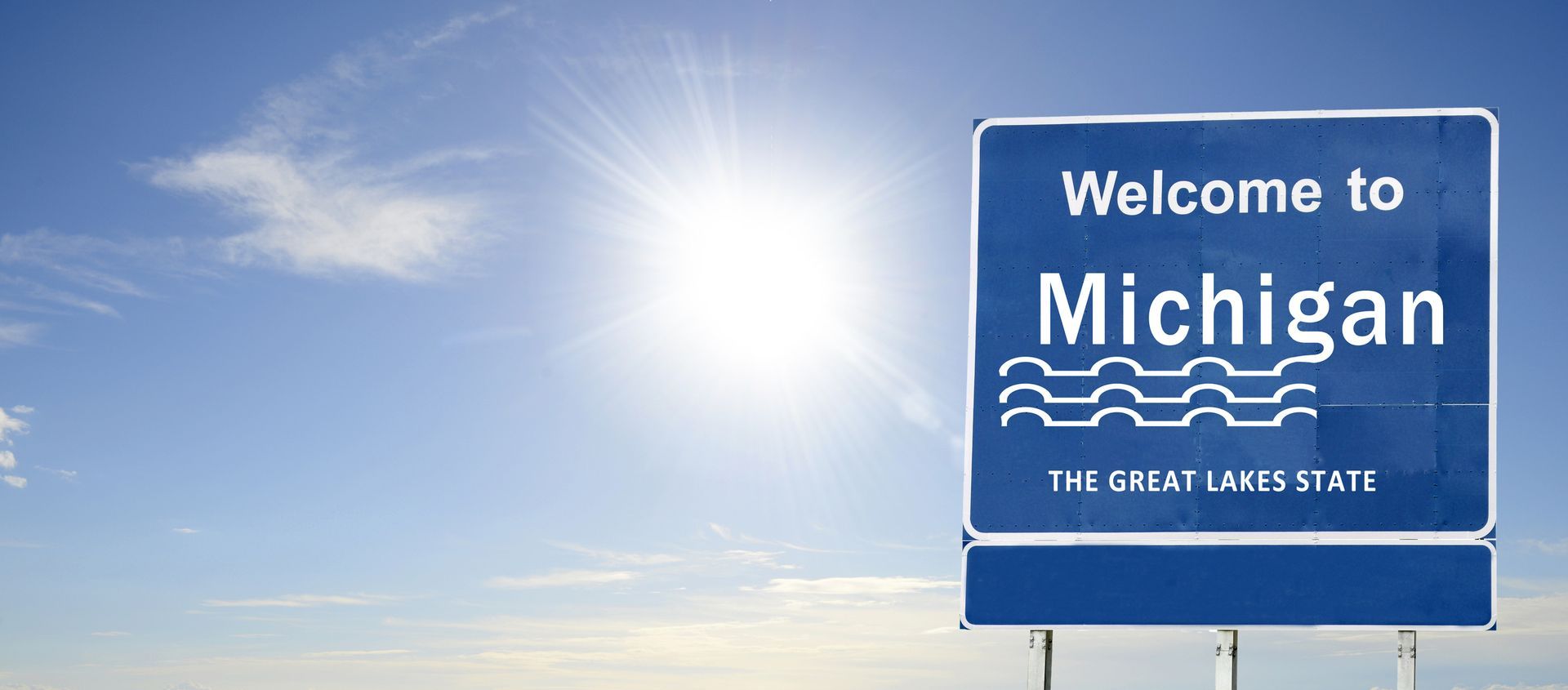 Michigan state welcome road sign, showcasing quality exterior signs. A blue