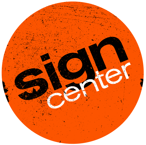 Sign Center Orange circle with distressed texture. Text reads