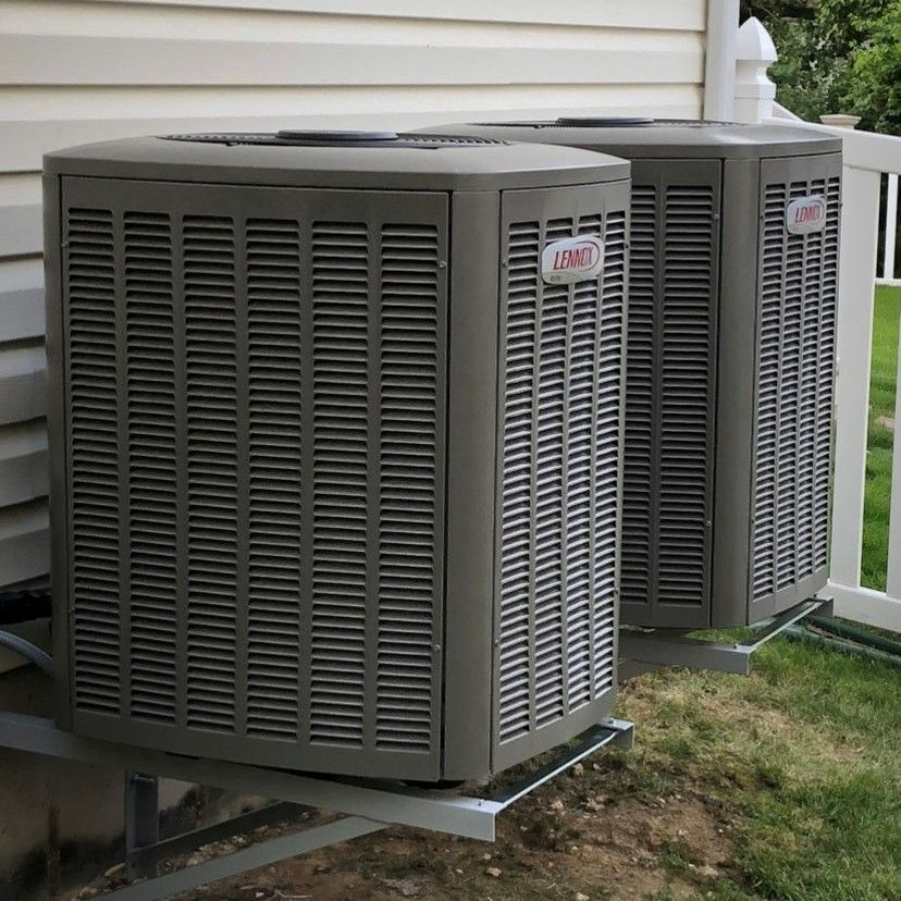 Two Air Conditioners On A Rack — St. Louis, MO — Best Air Heating and Cooling LLC