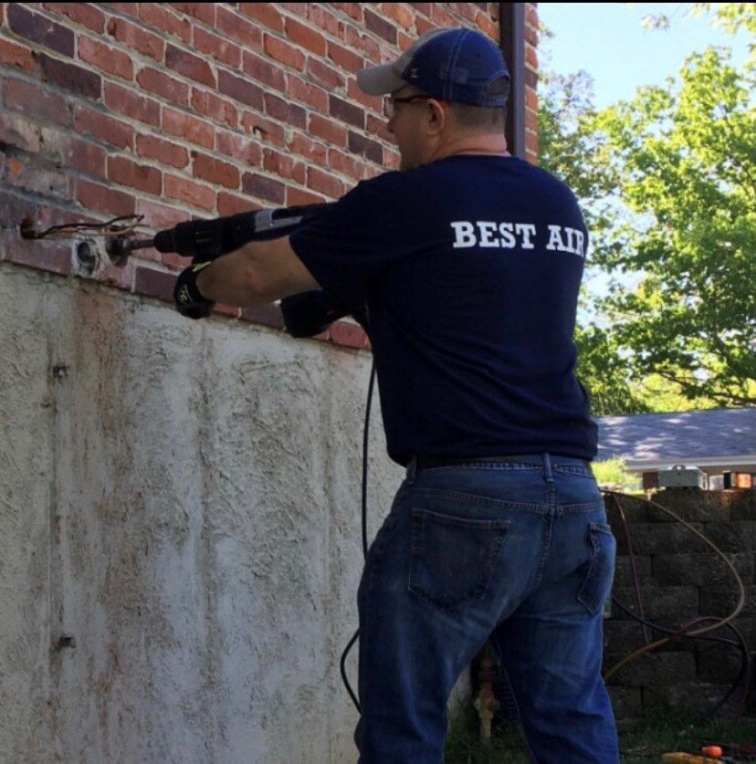HVAC Technician At Work — St. Louis, MO — Best Air Heating and Cooling LLC HVAC Technician At Work — St. Louis, MO — Best Air Heating and Cooling LLC