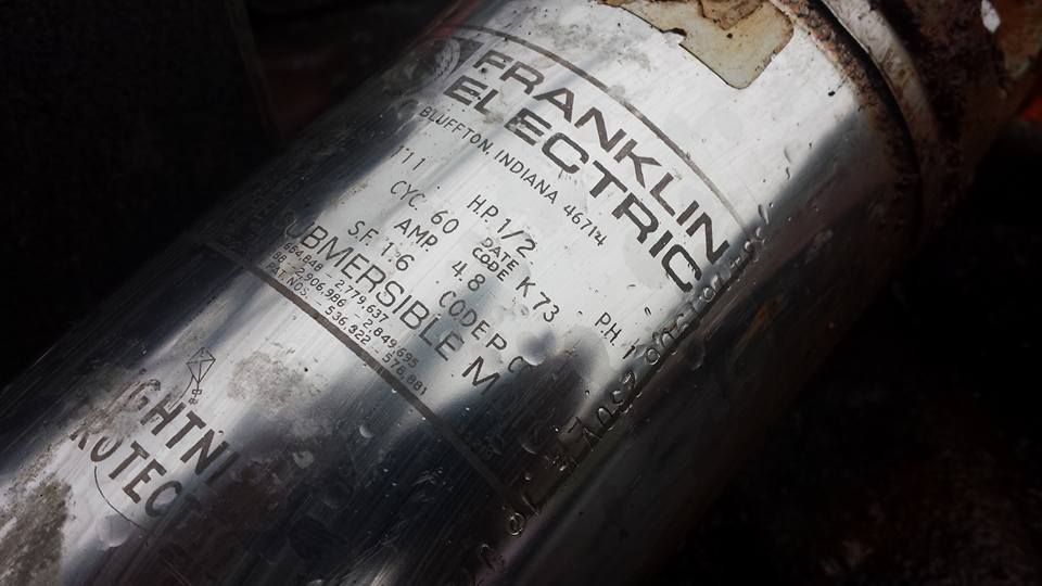 Silver Franklin Electric submersible motor label with text and specifications. Silver Franklin Electric submersible motor label with text and specifications.