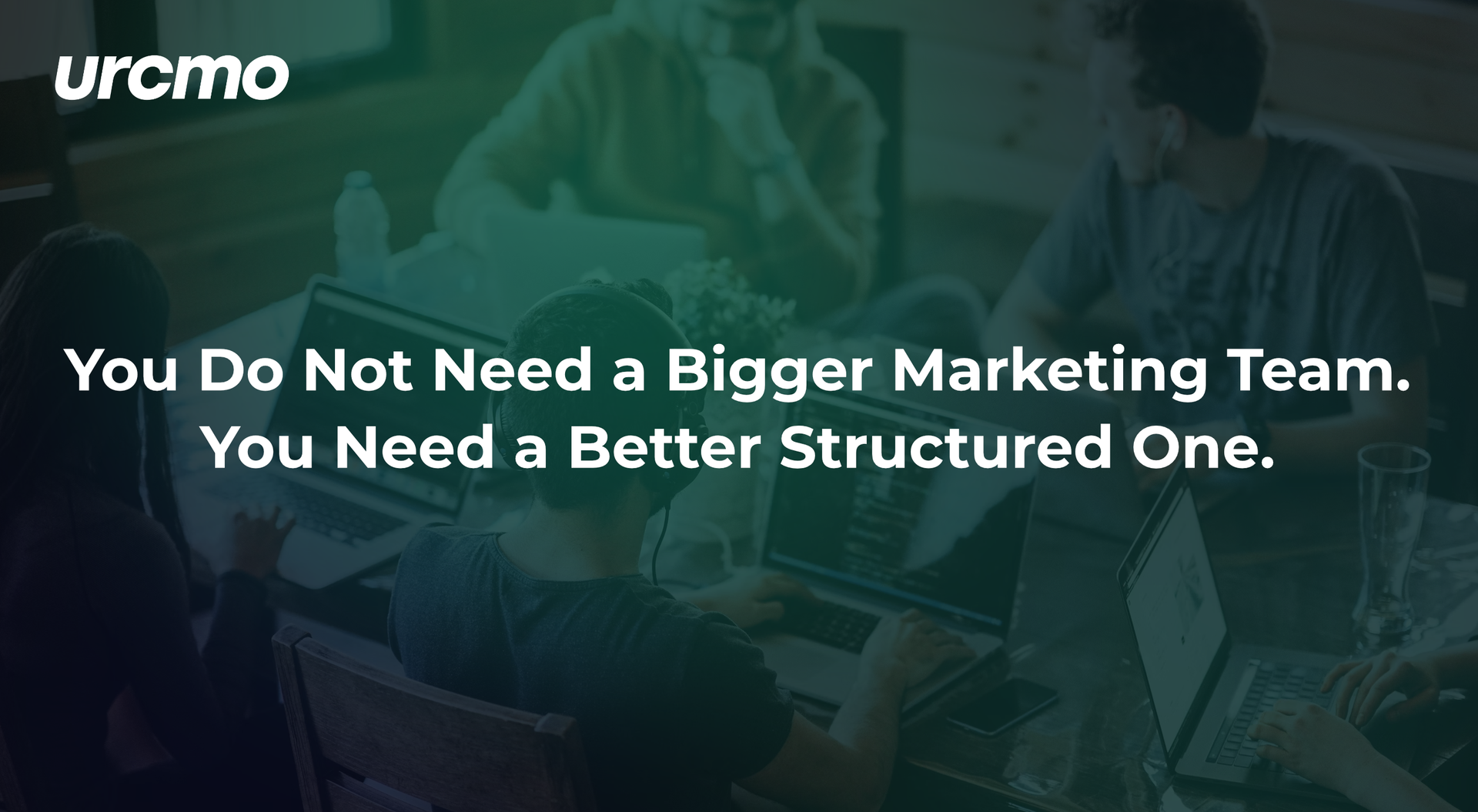 Two people review marketing strategy on a laptop; text reads, “You Need a Better Structured One.”