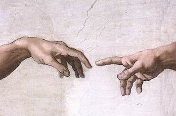 Detail from Michelangelo's Sistine Chapel with the creation of Adam