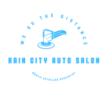 Rain City Auto Salon logo. A blue car polishing tool within an arc that says, “We go the distance” with the business name below.
