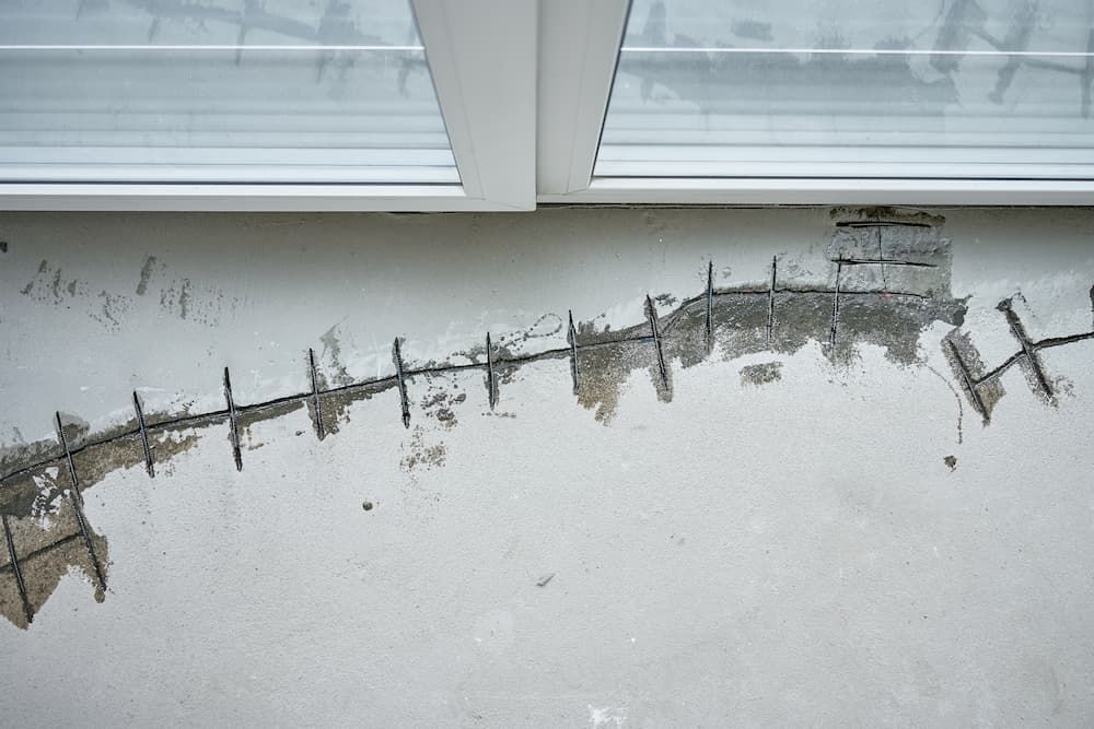 Close-up of a Weathered Concrete Wall With a Large Horizontal Crack — Consider It Sealed Waterproofing in Crangan Bay, NSW