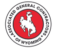 Associated General Contractors of Wyoming circular logo with red border and white bison silhouette on black background