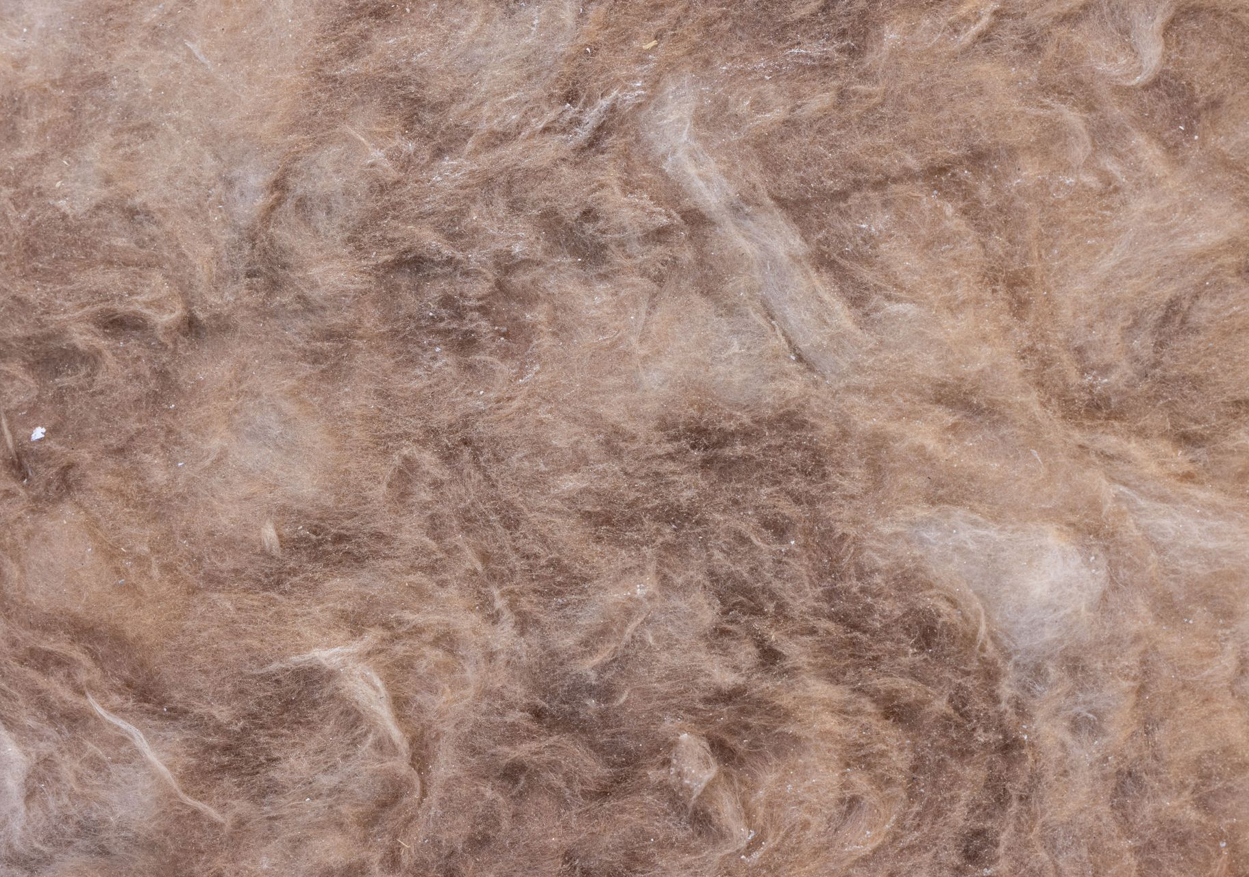 Close-up of a brown and tan marble or stone-like textured surface