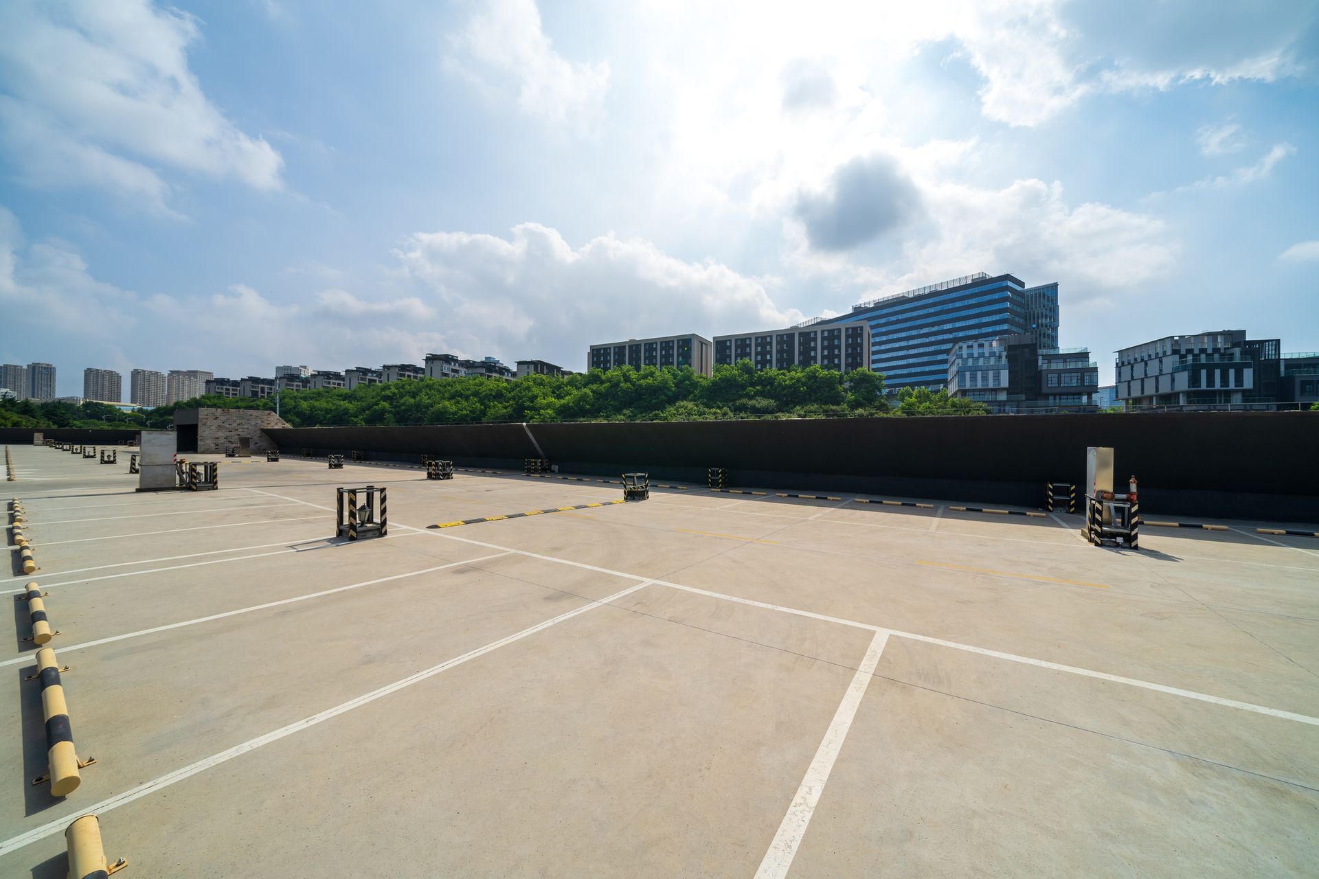 Angled image of a concrete sidewalk, with a building in the background Angled image of a concrete sidewalk, with a building in the background