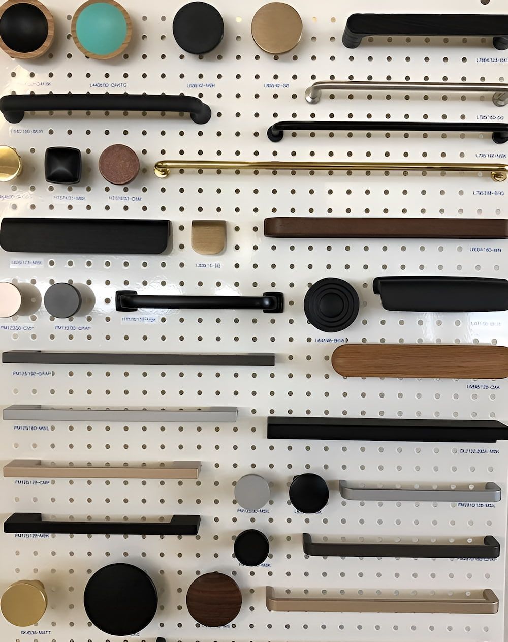 A Wall With A Lot Of Different Types Of Handles On It — Wood Cabinet Hardware Distributors In Bungalow, QLD