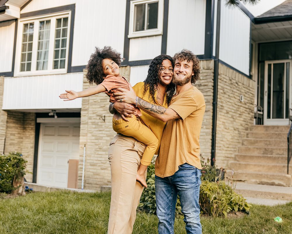 Family in Front of a House — Somerset, KY — Pearson Insurance Agency