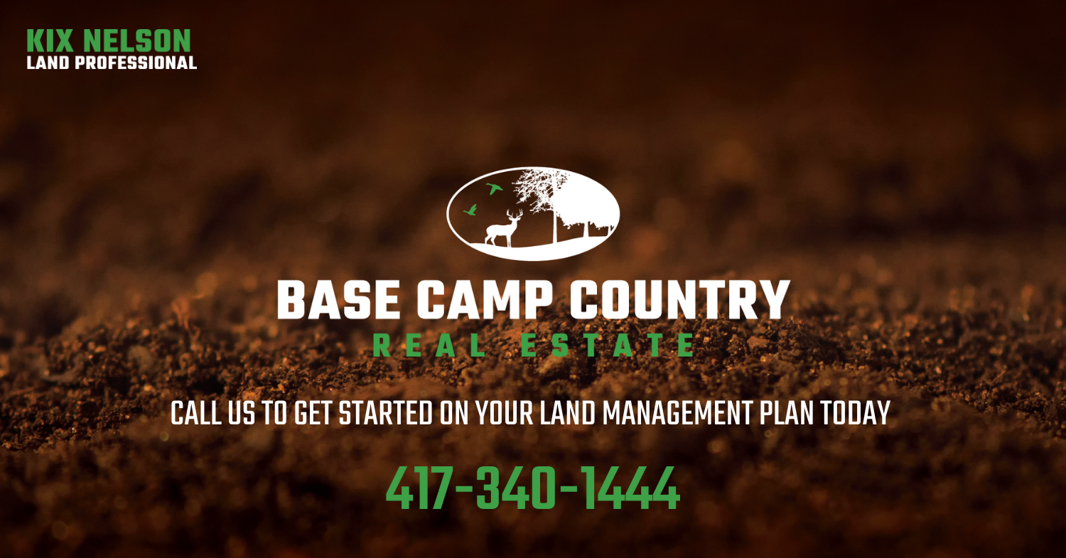 An ad for base camp country real estate with a phone number